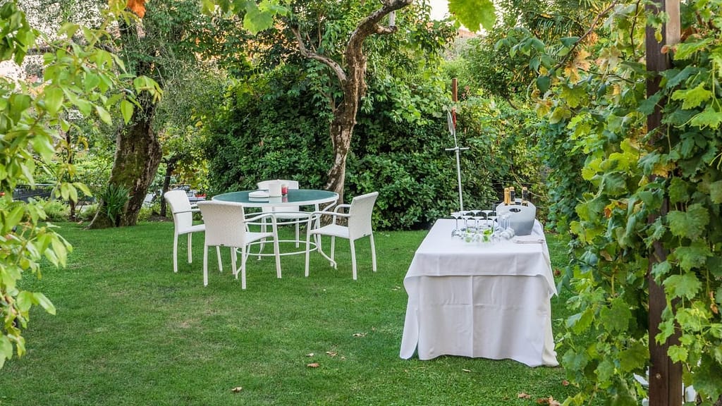 Elegant garden furniture set in a lush garden